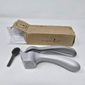The Pampered Chef Garlic Press