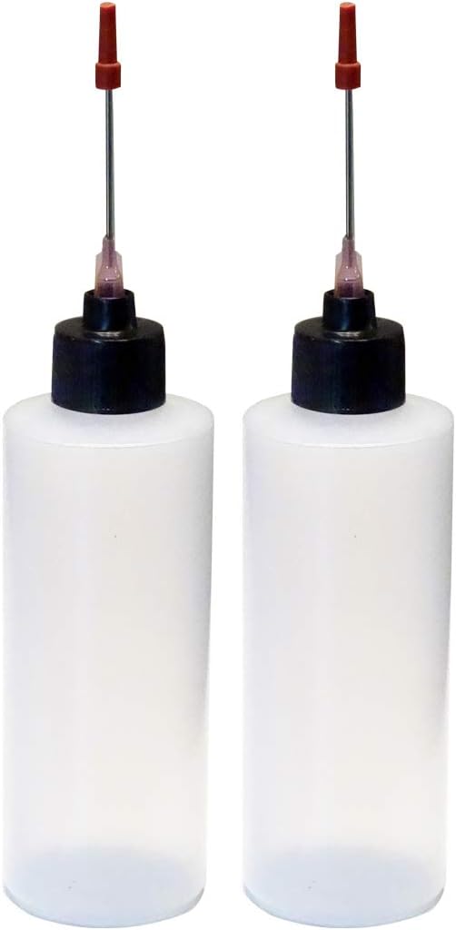 2-4oz Plastic Squeeze Bottles by Unknown